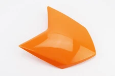 X-Road 200-250 пластик - обтічник фари (верхня частина) ПОМАРАНЧЕВИЙ з 2017р